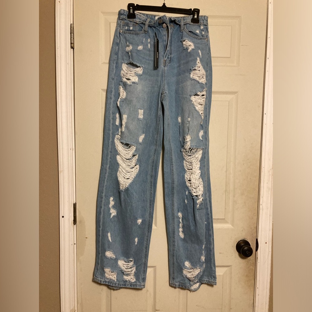 Fashion Nova ripped jeans.